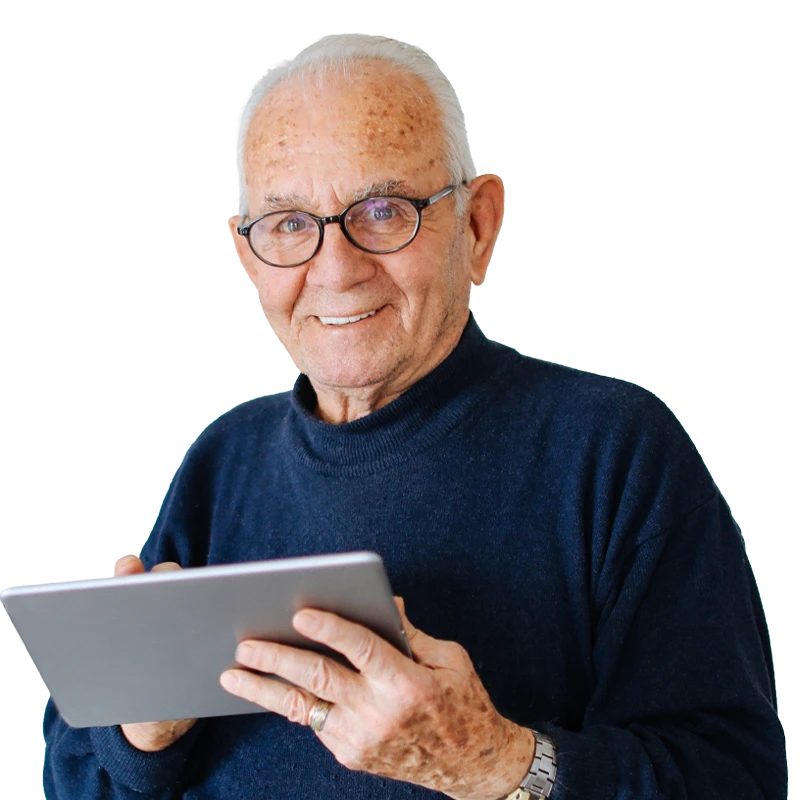 older man holding a tablet, smiling at the camera